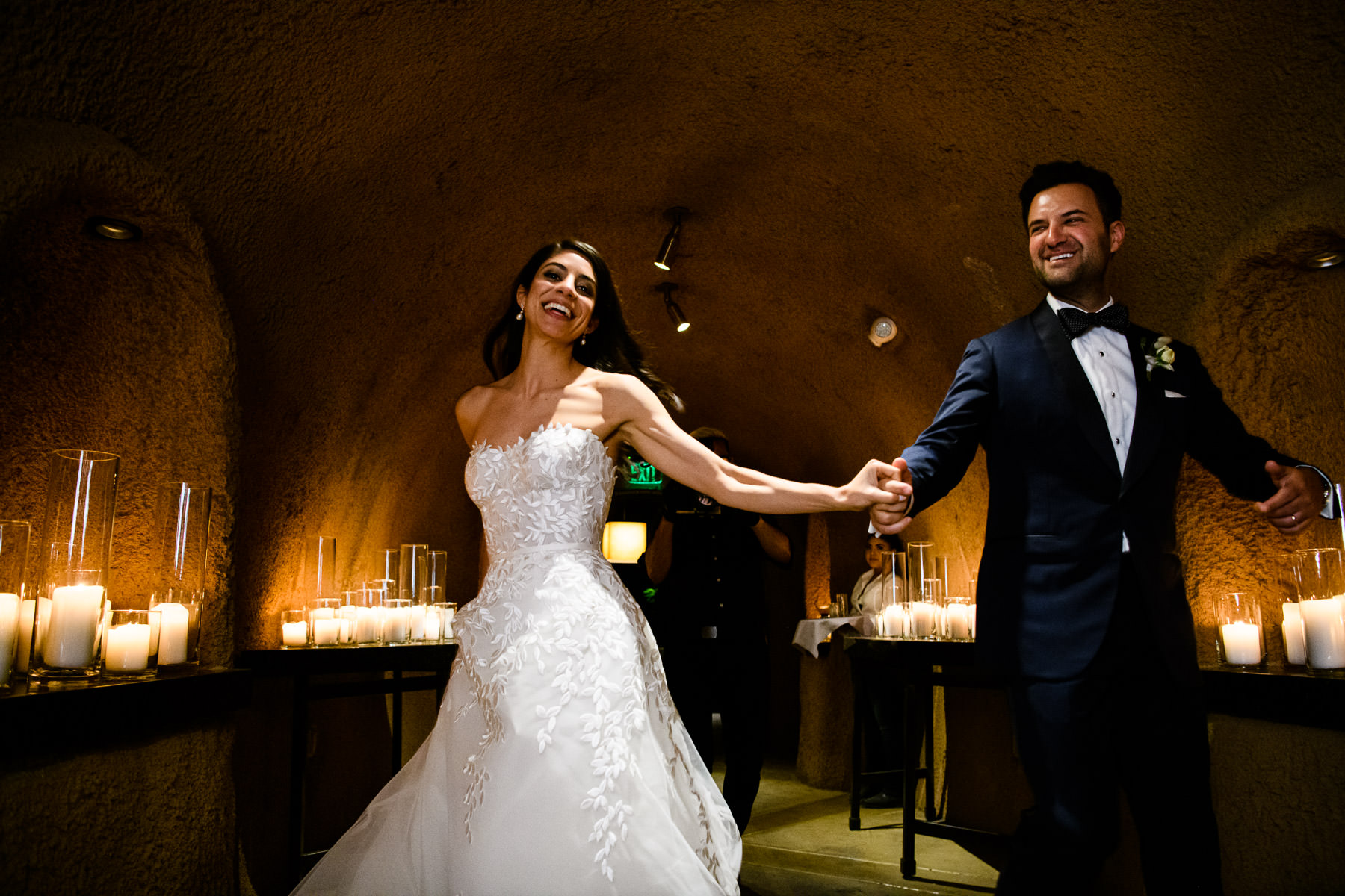 Bride and Groom enter wine cave at Calistoga Ranch Wedding by Duy Ho
