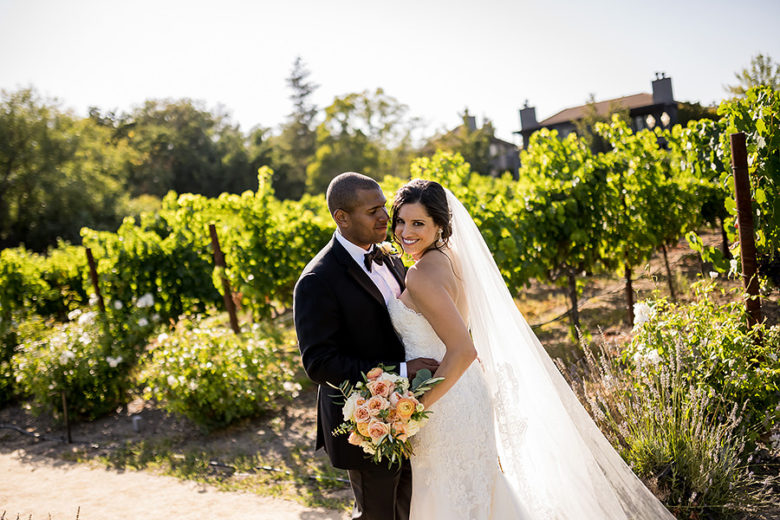 bride and groom in vineyard portrait at yountville estate wedding
