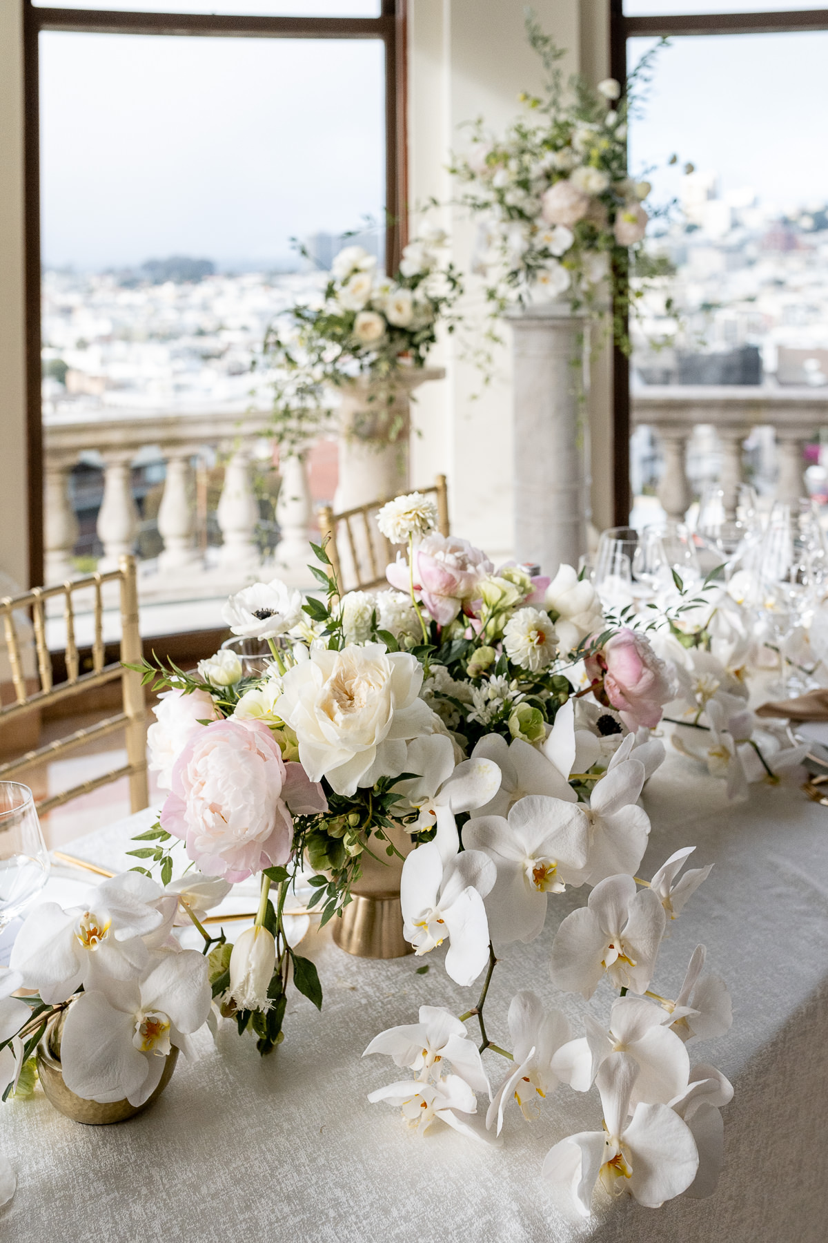 Gold place setting and menu card at Flood Mansion wedding reception, elegant table detail San Francisco