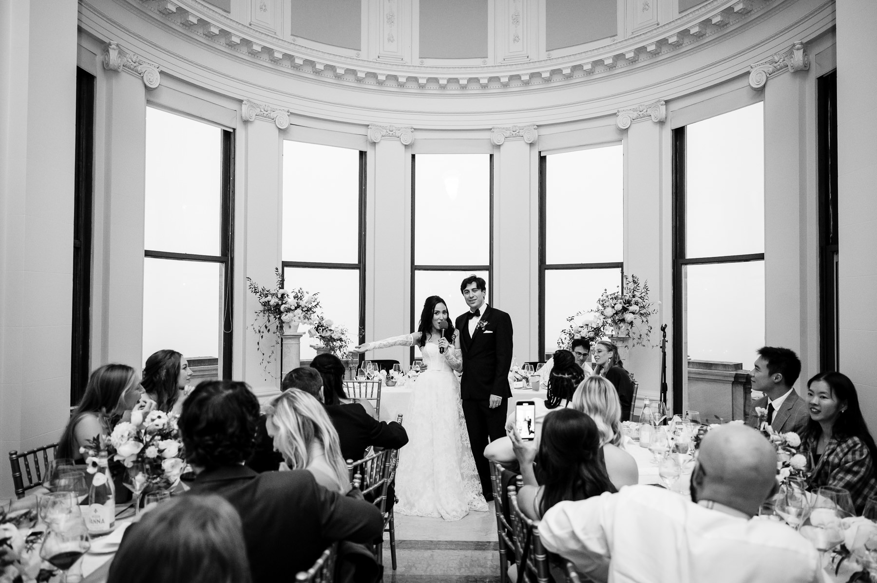 Groom twirling bride during first dance in Flood Mansion Grand Hall, San Francisco mansion wedding reception