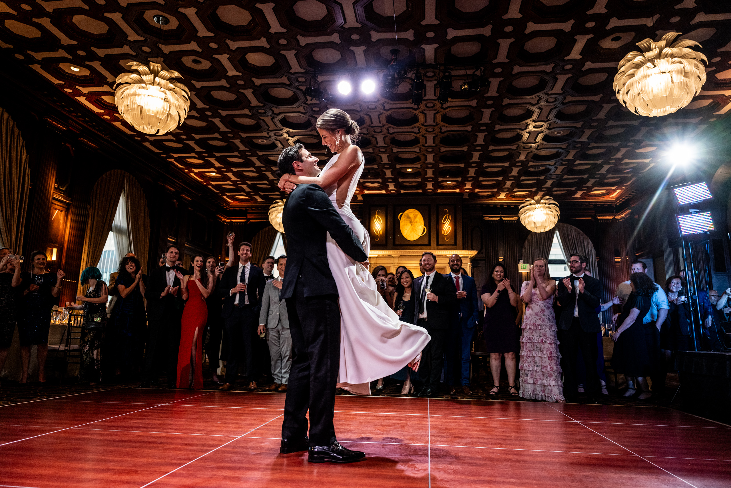 How to choose a wedding photographer - couple's first dance lift at San Francisco wedding